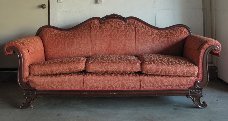 Silk couch defining the Victorian era.